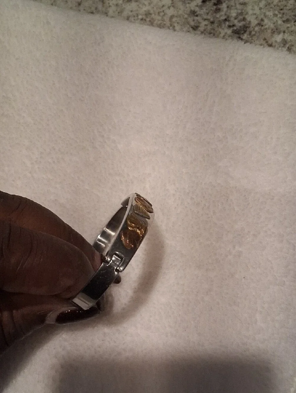Silver-Tone Bangle Bracelet with Gold Accent Charms